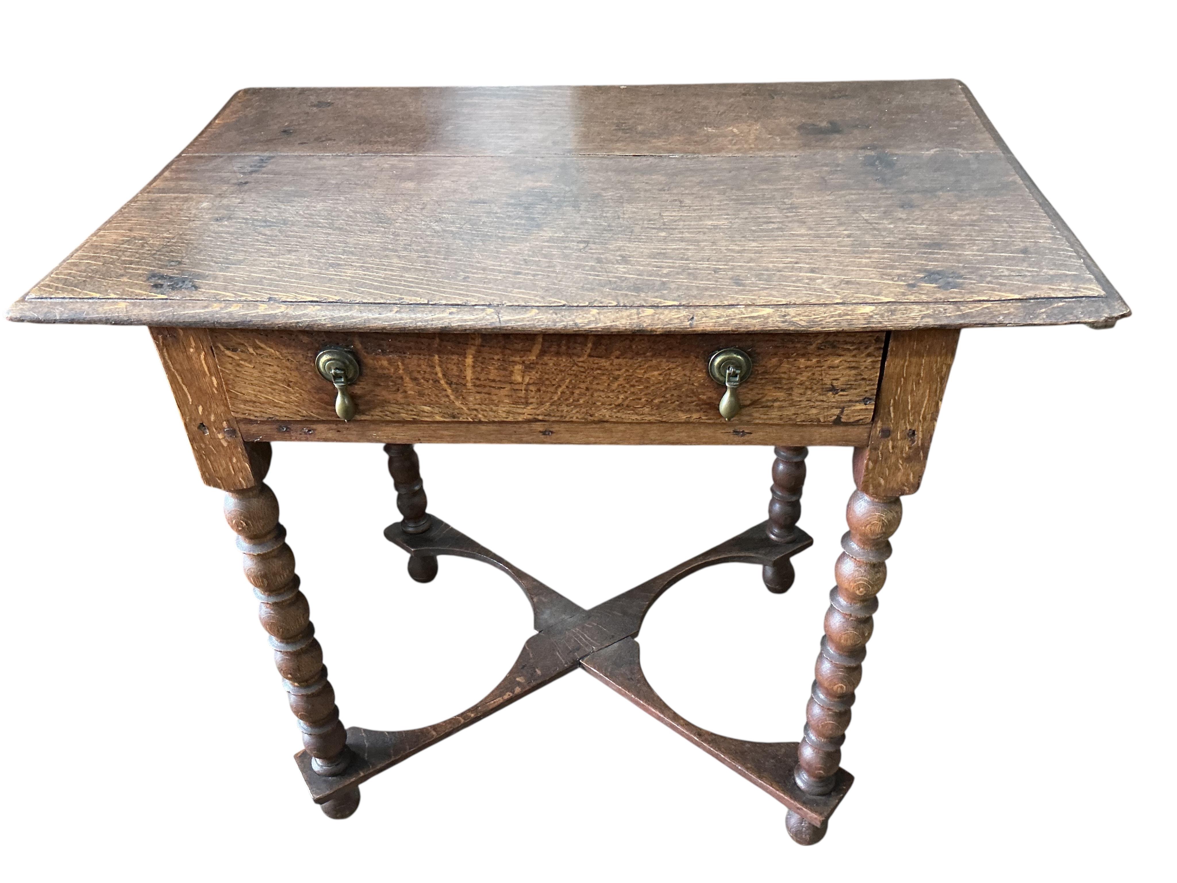 An 18th century rectangular oak bobbin leg side table, width 81cm, depth 50cm, height 71cm